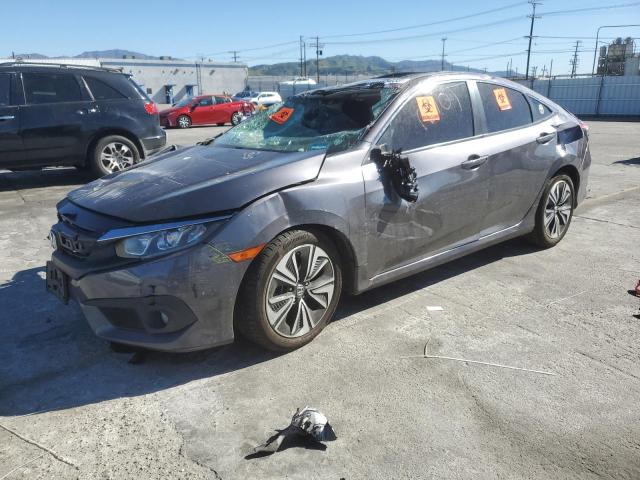 HONDA CIVIC EX 2016 with VIN 2HGFC1F48GH640983 - Photo from auction