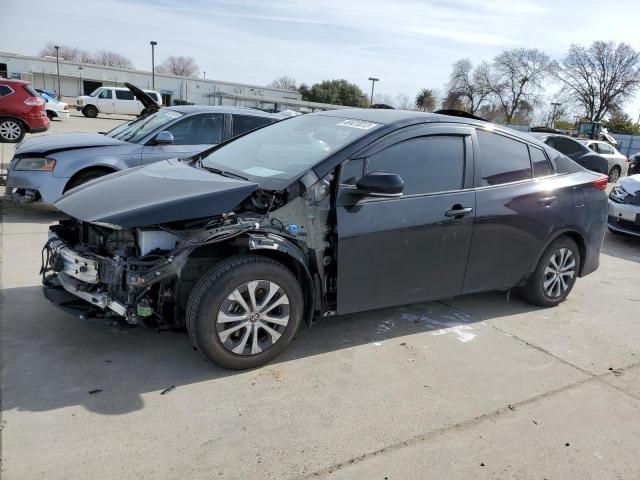 TOYOTA PRIUS PRIM 2021 with VIN JTDKAMFP6M3172197 - Photo from auction