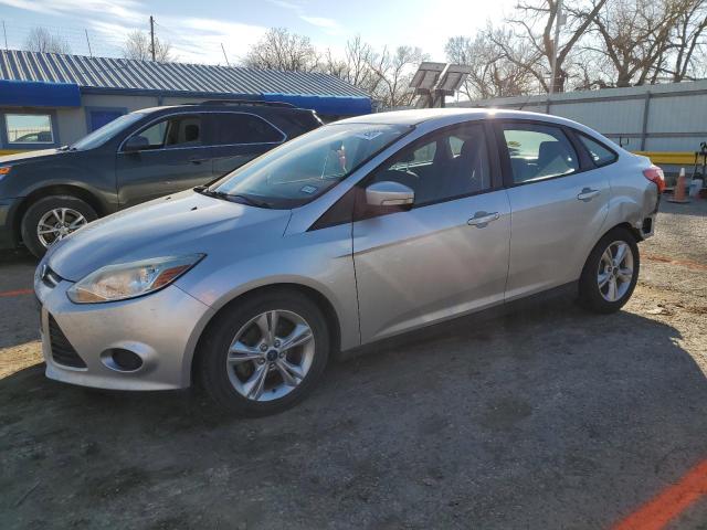 FORD FOCUS SE 2014 with VIN 1FADP3F24EL296370 - Photo from auction