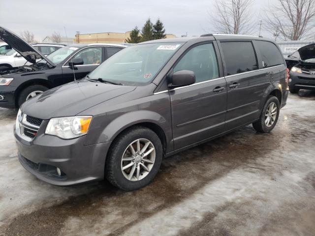 DODGE GRAND CARA 2015 with VIN 2C4RDGBG0FR669379 - Photo from auction