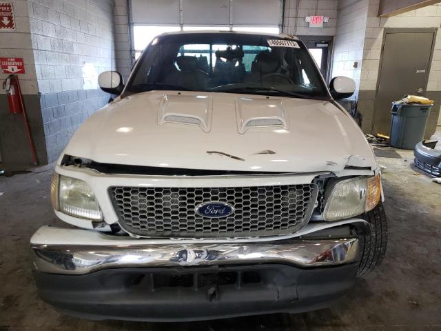 Photo 5 from auction – 2002 FORD F150 with VIN 1FTRX17L32NB05050