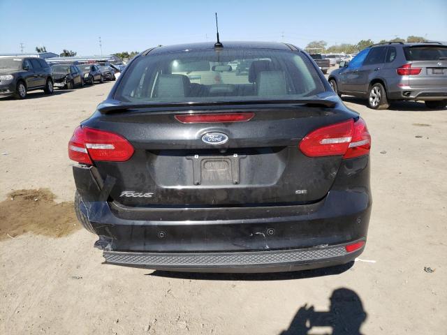 Photo 6 from auction – 2015 FORD FOCUS SE with VIN 1FADP3F21FL275395