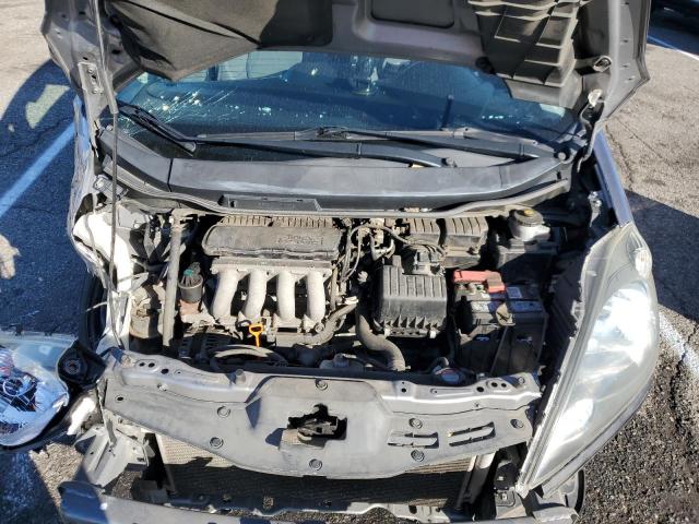 Photo 11 from auction – 2009 HONDA FIT with VIN JHMGE88259S052356