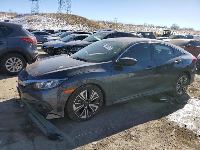 HONDA CIVIC EXL 2017 with VIN 19XFC1F76HE028142 - Photo from auction