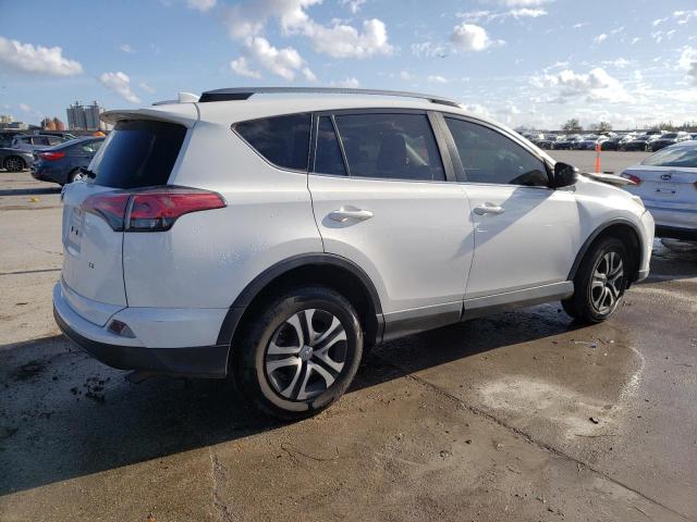 Photo 3 from auction – 2018 TOYOTA RAV4 LE with VIN JTMZFREV1JD129664
