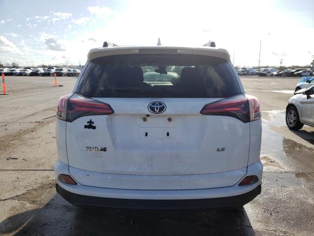 Photo 6 from auction – 2018 TOYOTA RAV4 LE with VIN JTMZFREV1JD129664