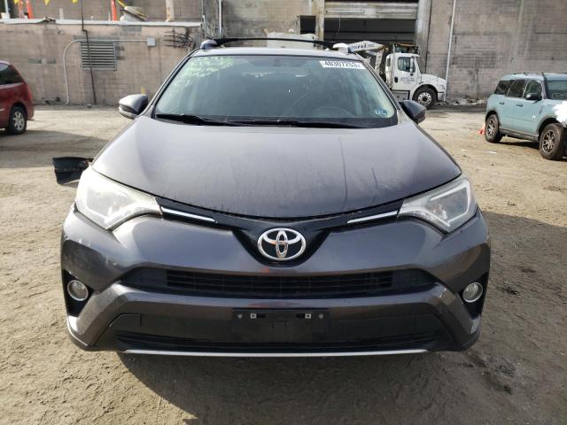 Photo 5 from auction – 2016 TOYOTA RAV4 XLE with VIN JTMWFREV7GJ061495