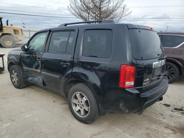 Photo 2 from auction – 2011 HONDA PILOT TOUR with VIN 5FNYF4H97BB090506