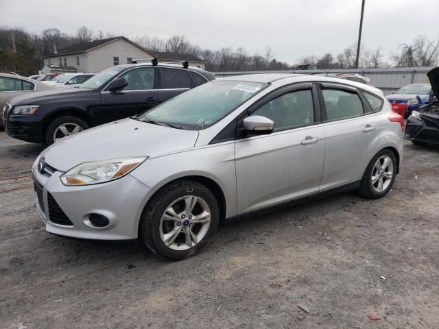 FORD FOCUS SE 2013 with VIN 1FADP3K28DL216122 - Photo from auction