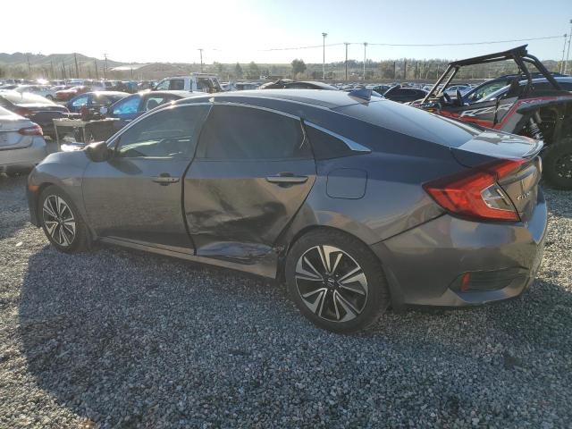 Photo 2 from auction – 2016 HONDA CIVIC EX with VIN 2HGFC1F35GH660020