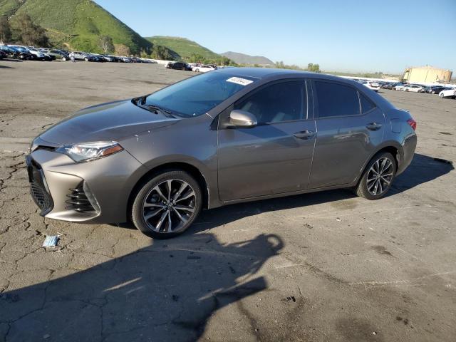 TOYOTA COROLLA L 2018 with VIN 5YFBURHE3JP762764 - Photo from auction