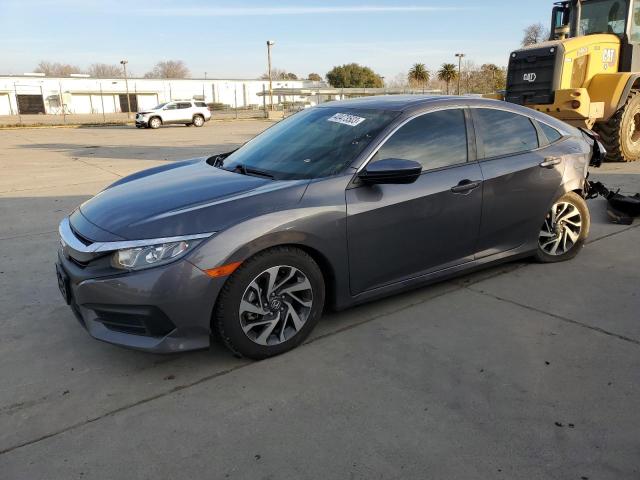 HONDA CIVIC EX 2018 with VIN 2HGFC2F7XJH545008 - Photo from auction