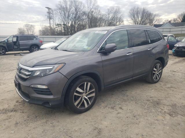 Photo 1 from auction – 2018 HONDA PILOT ELIT with VIN 5FNYF6H0XJB030845