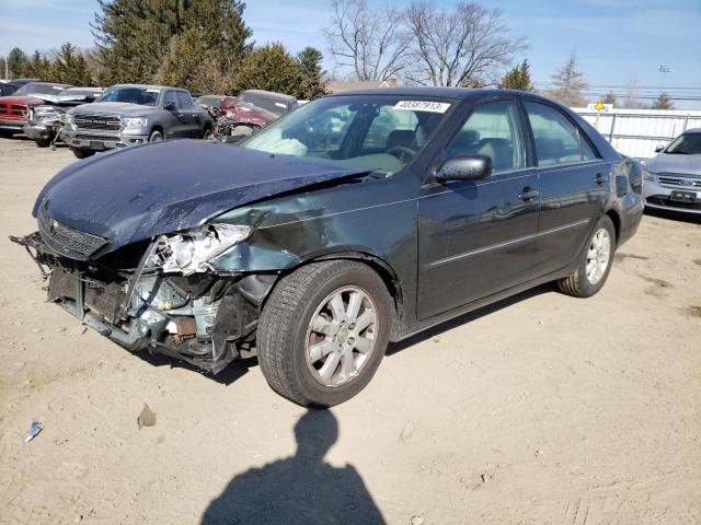 TOYOTA CAMRY LE 2003 with VIN 4T1BE30K23U733477 - Photo from auction