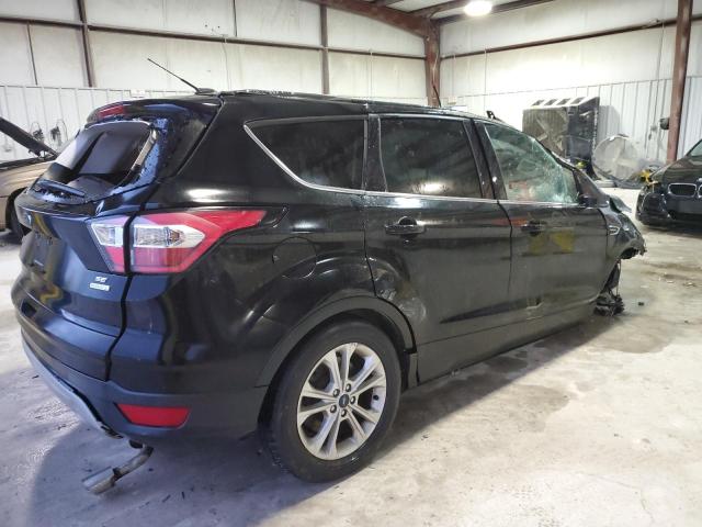 Photo 3 from auction – 2017 FORD ESCAPE SE with VIN 1FMCU0GD2HUC23084