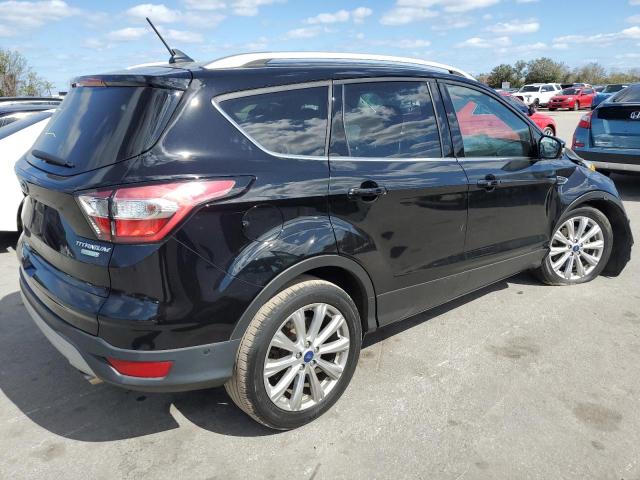 Photo 3 from auction – 2018 FORD ESCAPE TIT with VIN 1FMCU0J90JUA70750