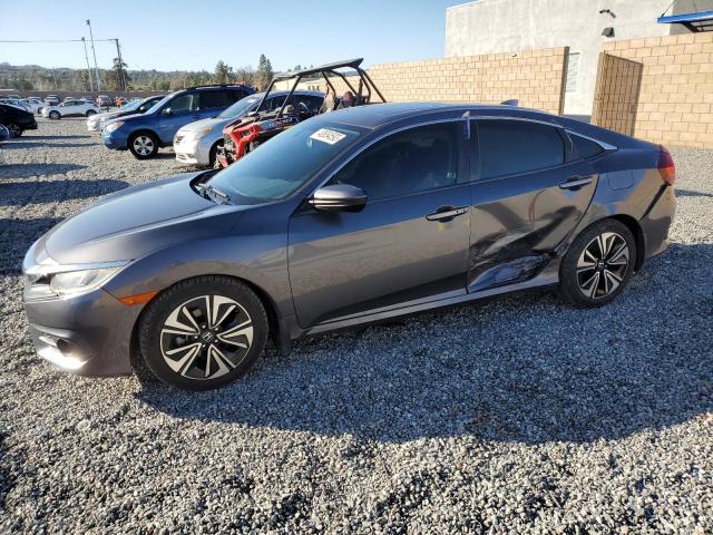Photo 1 from auction – 2016 HONDA CIVIC EX with VIN 2HGFC1F35GH660020
