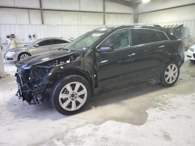 CADILLAC SRX PERFOR 2013 with VIN 3GYFNDE3XDS572739 - Photo from auction