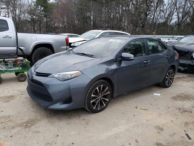 TOYOTA COROLLA L 2018 with VIN 2T1BURHE7JC010453 - Photo from auction