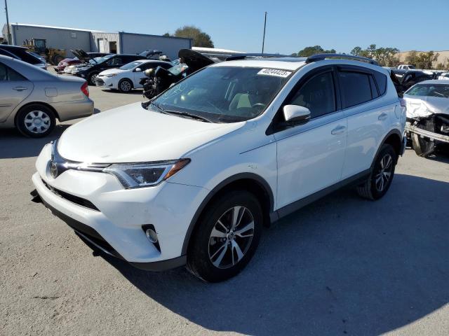 Photo 1 from auction – 2017 TOYOTA RAV4 XLE with VIN JTMWFREV9HJ102680