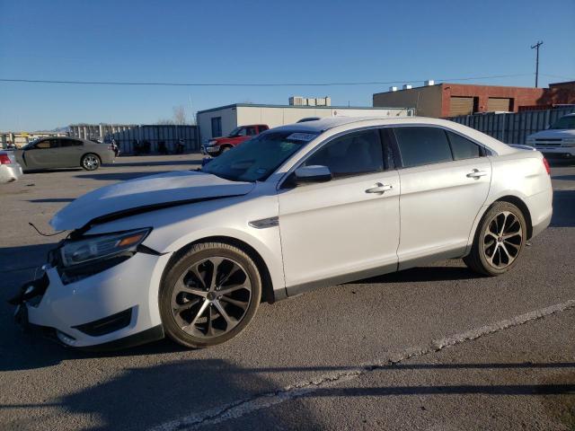 FORD TAURUS SEL 2014 with VIN 1FAHP2E83EG185013 - Photo from auction