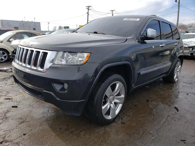JEEP GRAND CHER 2011 with VIN 1J4RR4GG3BC518879 - Photo from auction