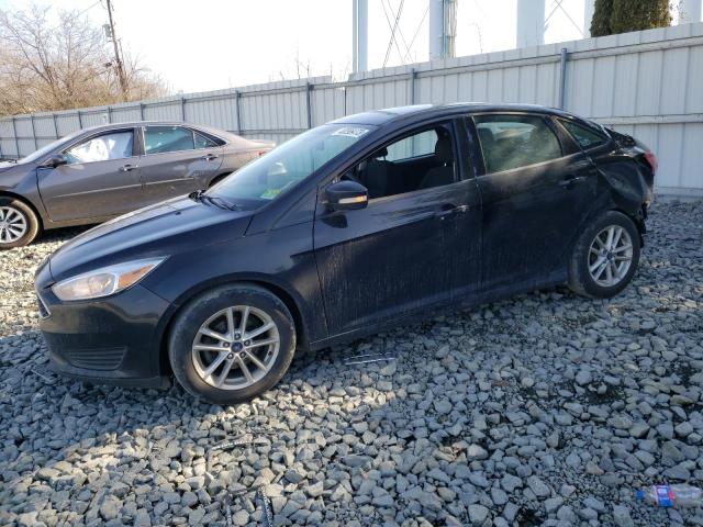 FORD FOCUS SE 2016 with VIN 1FADP3F27GL285611 - Photo from auction