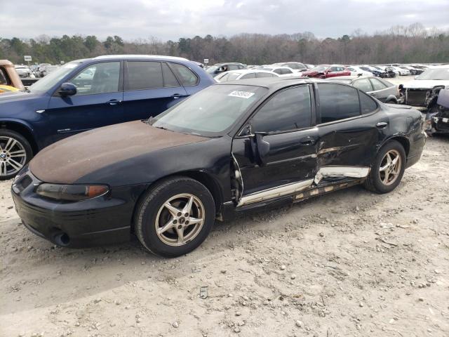 PONTIAC GRAND PRIX 2002 with VIN 1G2WP52K32F111552 - Photo from auction