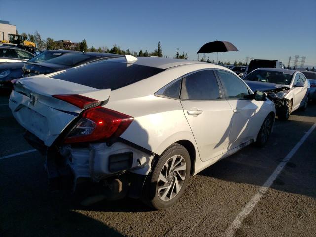 Photo 3 from auction – 2018 HONDA CIVIC EX with VIN 2HGFC2F77JH555690