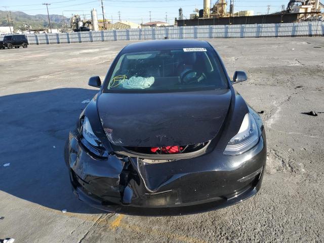 Photo 5 from auction – 2018 TESLA MODEL 3 with VIN 5YJ3E1EB4JF082395