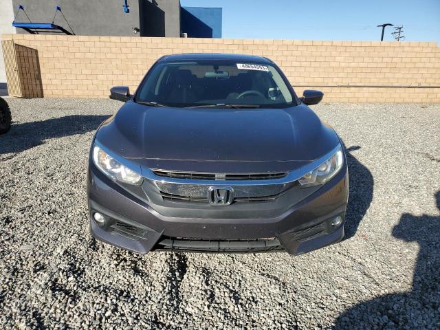 Photo 5 from auction – 2016 HONDA CIVIC EX with VIN 2HGFC1F35GH660020