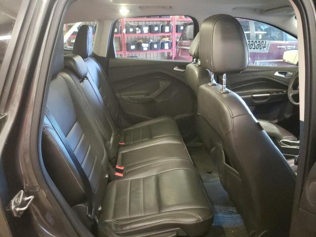 Photo 11 from auction – 2016 FORD ESCAPE TIT with VIN 1FMCU9J90GUA65058