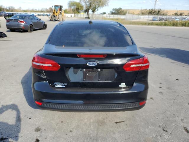 Photo 6 from auction – 2018 FORD FOCUS SE with VIN 1FADP3FE7JL319693
