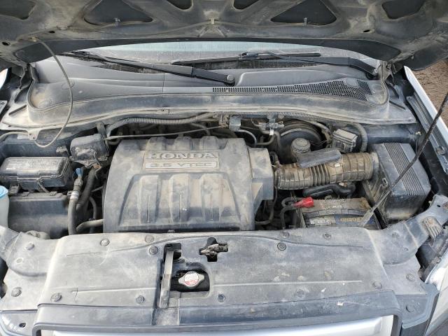 Photo 12 from auction – 2006 HONDA PILOT EX with VIN 2HKYF184X6H520815