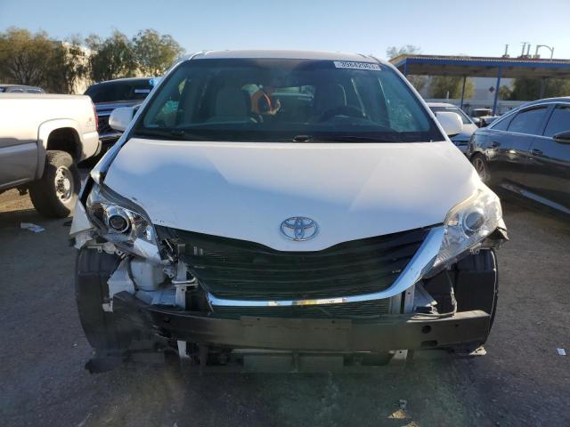Photo 5 from auction – 2014 TOYOTA SIENNA LE with VIN 5TDKK3DC5ES482154