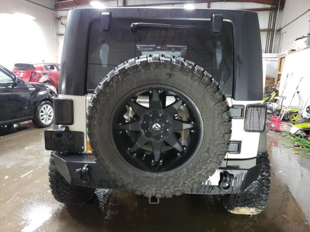 Photo 6 from auction – 2010 JEEP WRANGLER U with VIN 1J4BA3H19AL144709