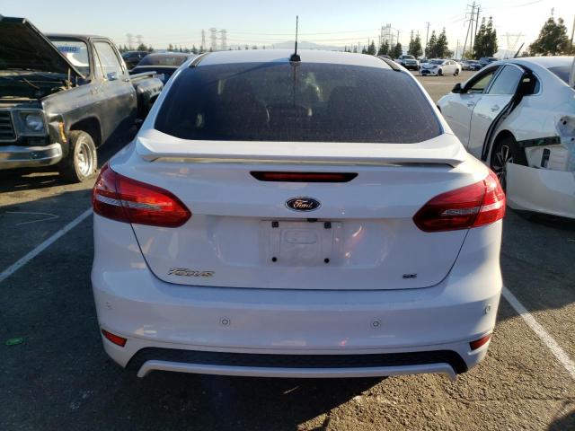 Photo 6 from auction – 2015 FORD FOCUS SE with VIN 1FADP3F20FL385905
