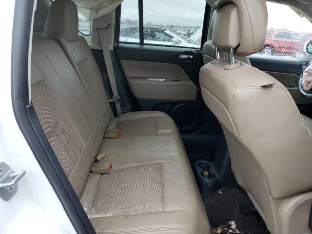 Photo 10 from auction – 2014 JEEP COMPASS LA with VIN 1C4NJDEB1ED827137