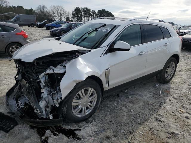 CADILLAC SRX LUXURY 2013 with VIN 3GYFNCE3XDS642928 - Photo from auction