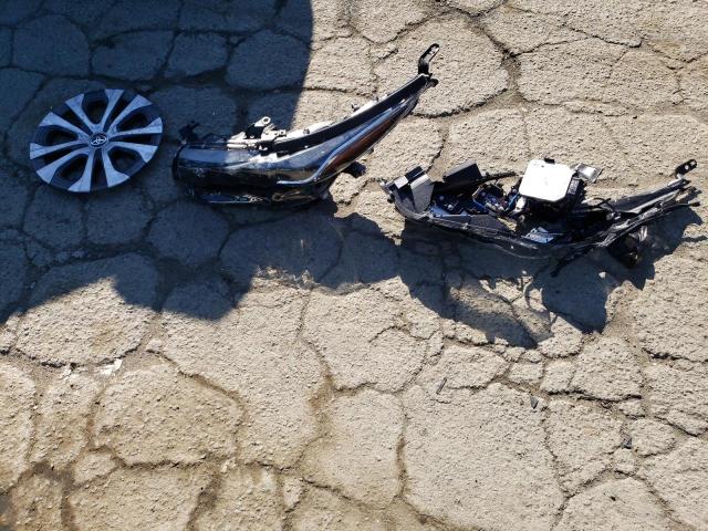 Photo 12 from auction – 2022 TOYOTA PRIUS PRIM with VIN JTDKAMFP3N3216951