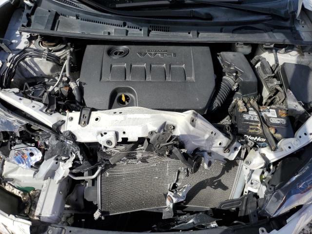 Photo 11 from auction – 2014 TOYOTA COROLLA L with VIN 2T1BURHE5EC075498