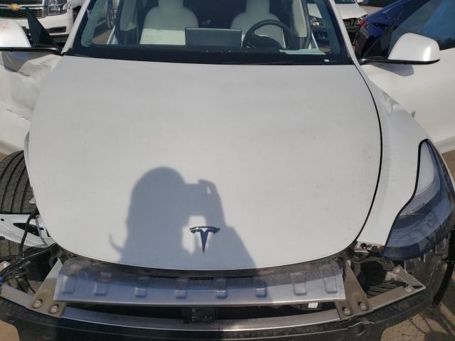 Photo 11 from auction – 2020 TESLA MODEL Y with VIN 5YJYGDEE9LF030940