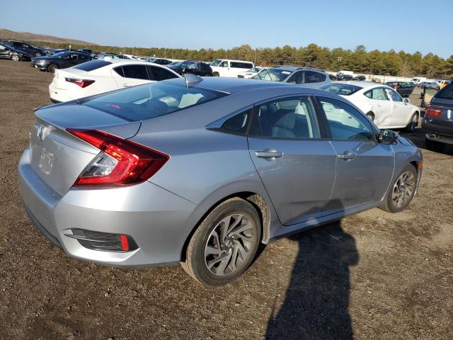 Photo 3 from auction – 2018 HONDA CIVIC EX with VIN 2HGFC2F76JH562999