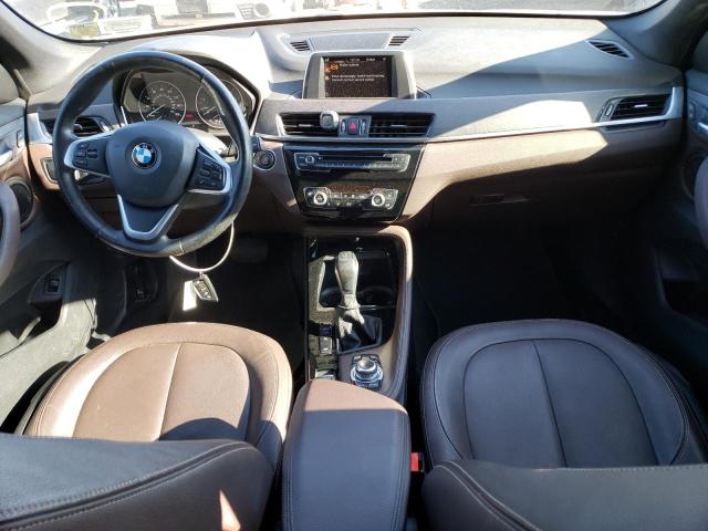 Photo 8 from auction – 2016 BMW X1 XDRIVE2 with VIN WBXHT3C35G5E47492
