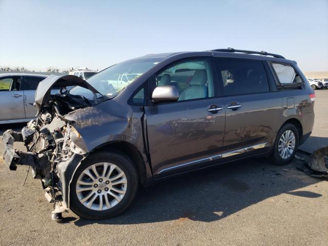 TOYOTA SIENNA XLE 2011 with VIN 5TDYK3DCXBS094570 - Photo from auction