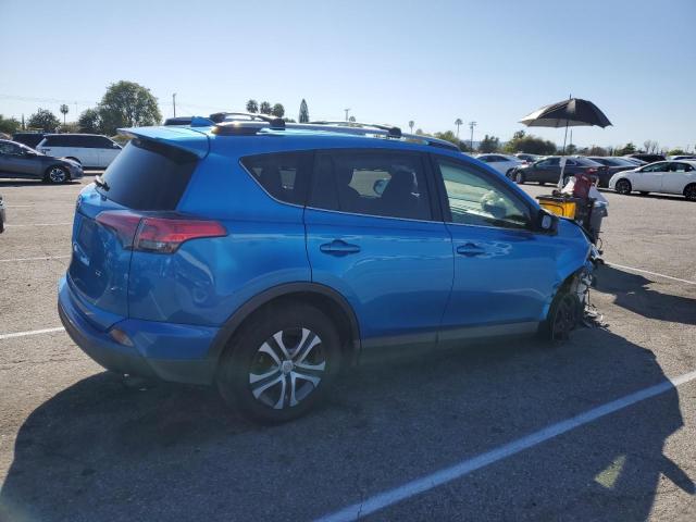 Photo 3 from auction – 2018 TOYOTA RAV4 LE with VIN JTMZFREV0JJ157750