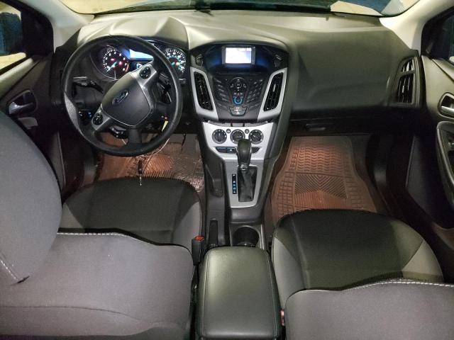 Photo 8 from auction – 2014 FORD FOCUS SE with VIN 1FADP3F23EL216749