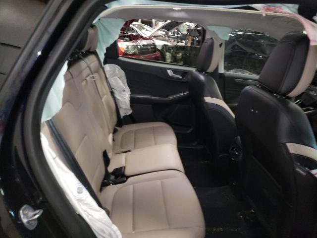 Photo 11 from auction – 2021 FORD ESCAPE TIT with VIN 1FMCU9J99MUA52689