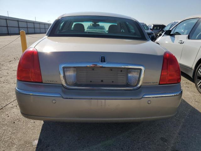 Photo 6 from auction – 2004 LINCOLN TOWN CAR E with VIN 1LNHM81W04Y614350