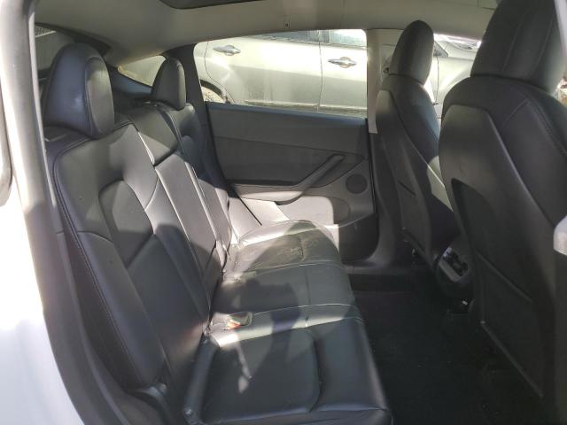 Photo 11 from auction – 2021 TESLA MODEL Y with VIN 5YJYGDEE4MF278644